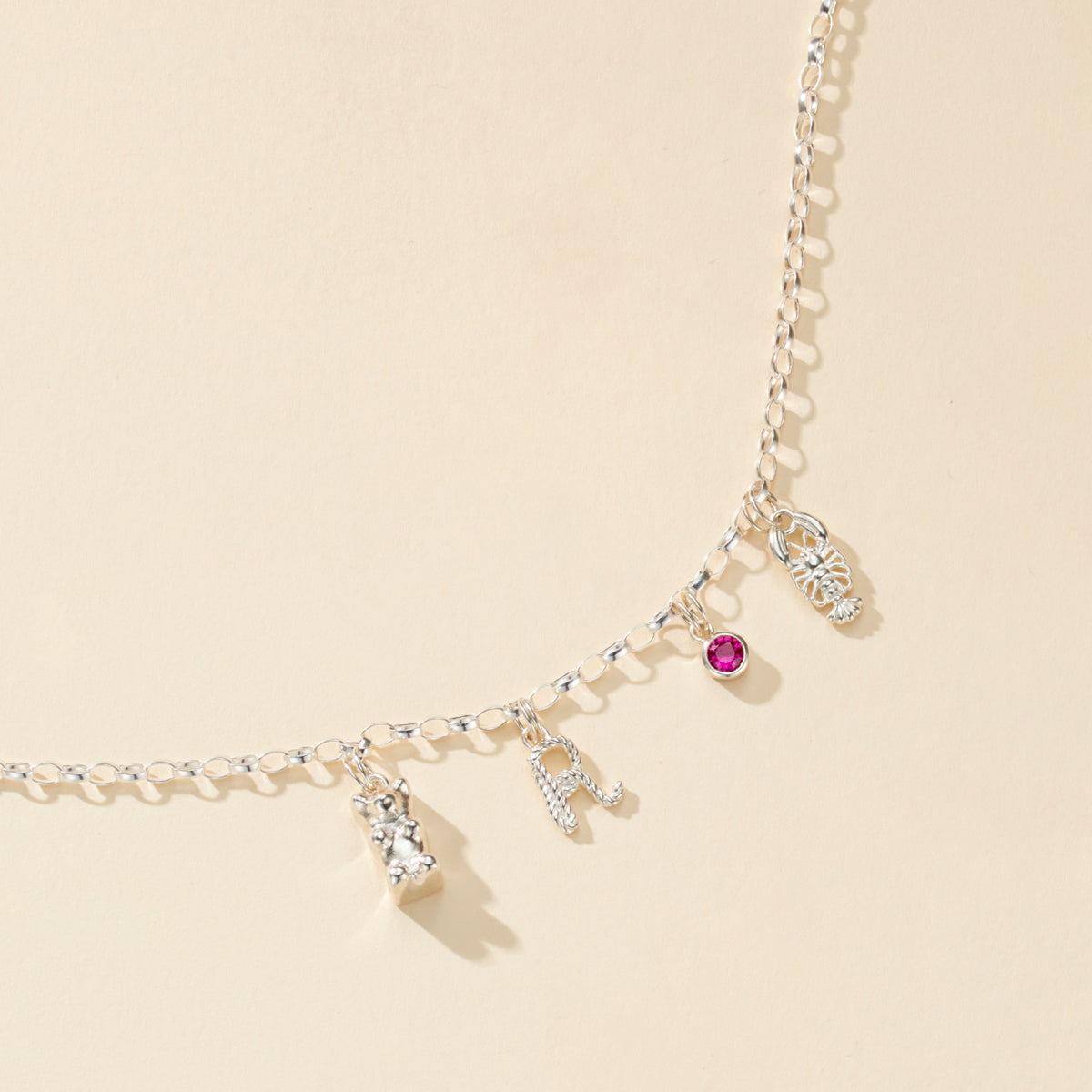 Tether Initial Letter Charm