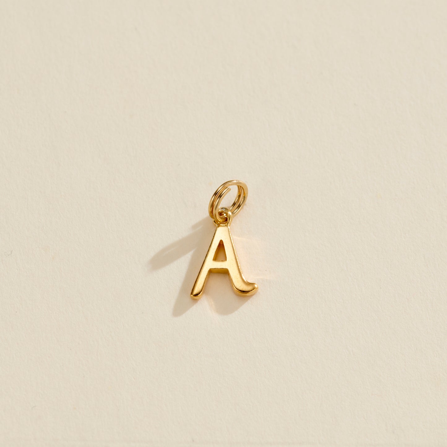 Italic Initial Letter Charm
