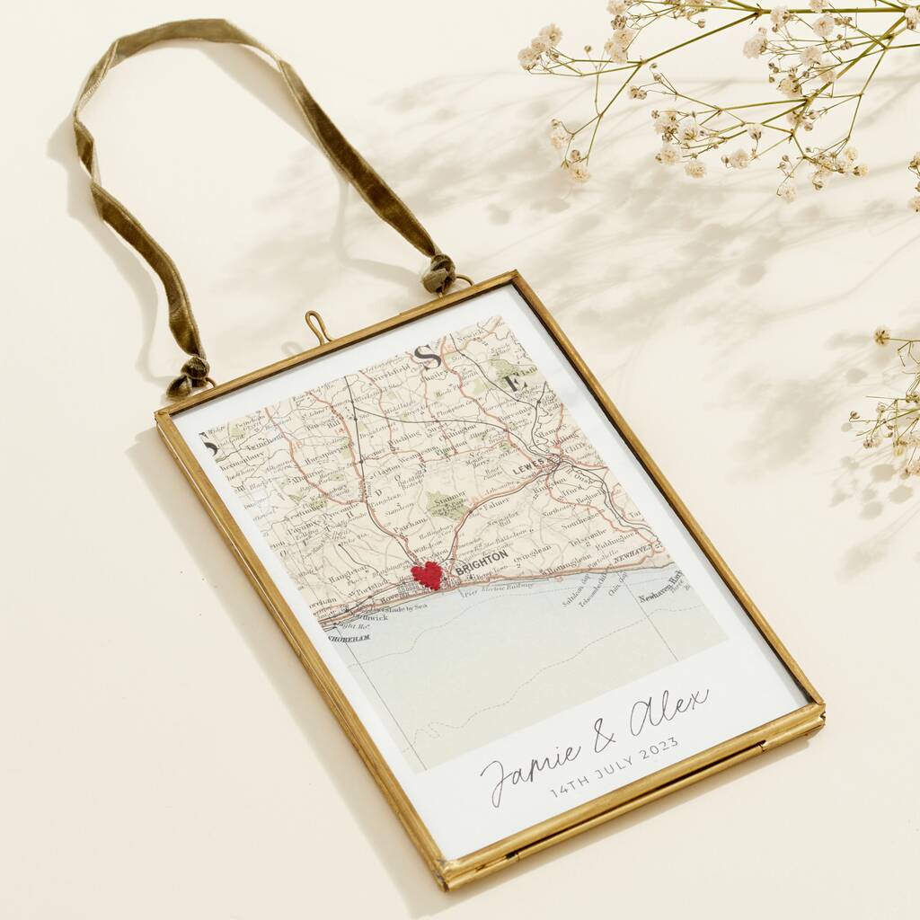 Personalised vintage map picture with stitched heart in a brass hanging frame