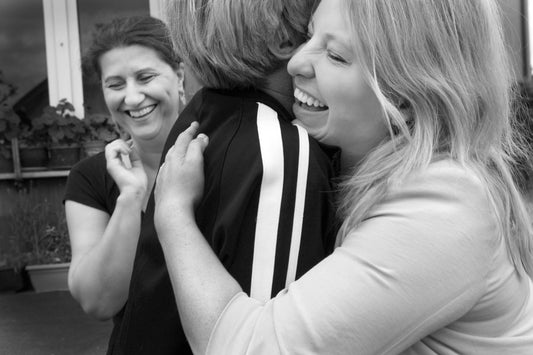 Ten Years, One Hug: Celebrating a Decade of Posh Totty Designs x Women for Women International