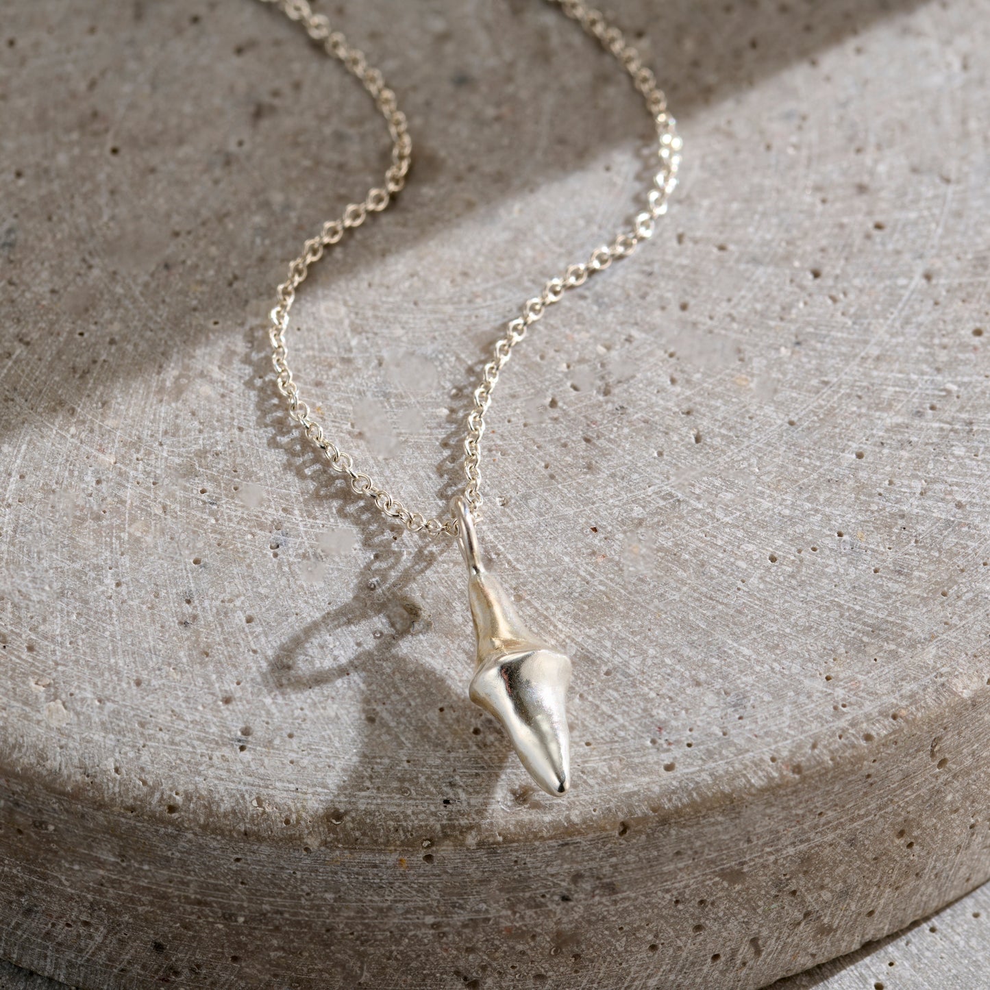 Men's Lucky Spinning Stone Necklace in silver finish