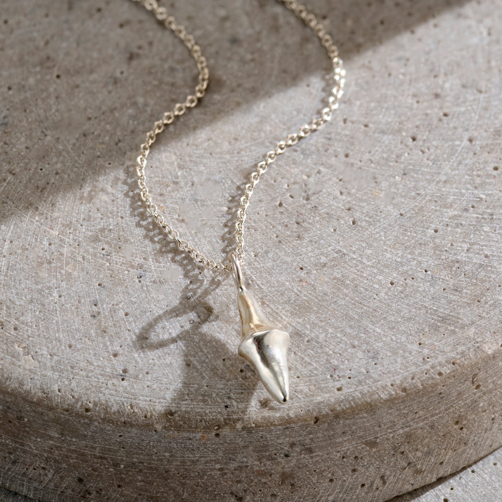 Men's Lucky Spinning Stone Necklace in silver finish