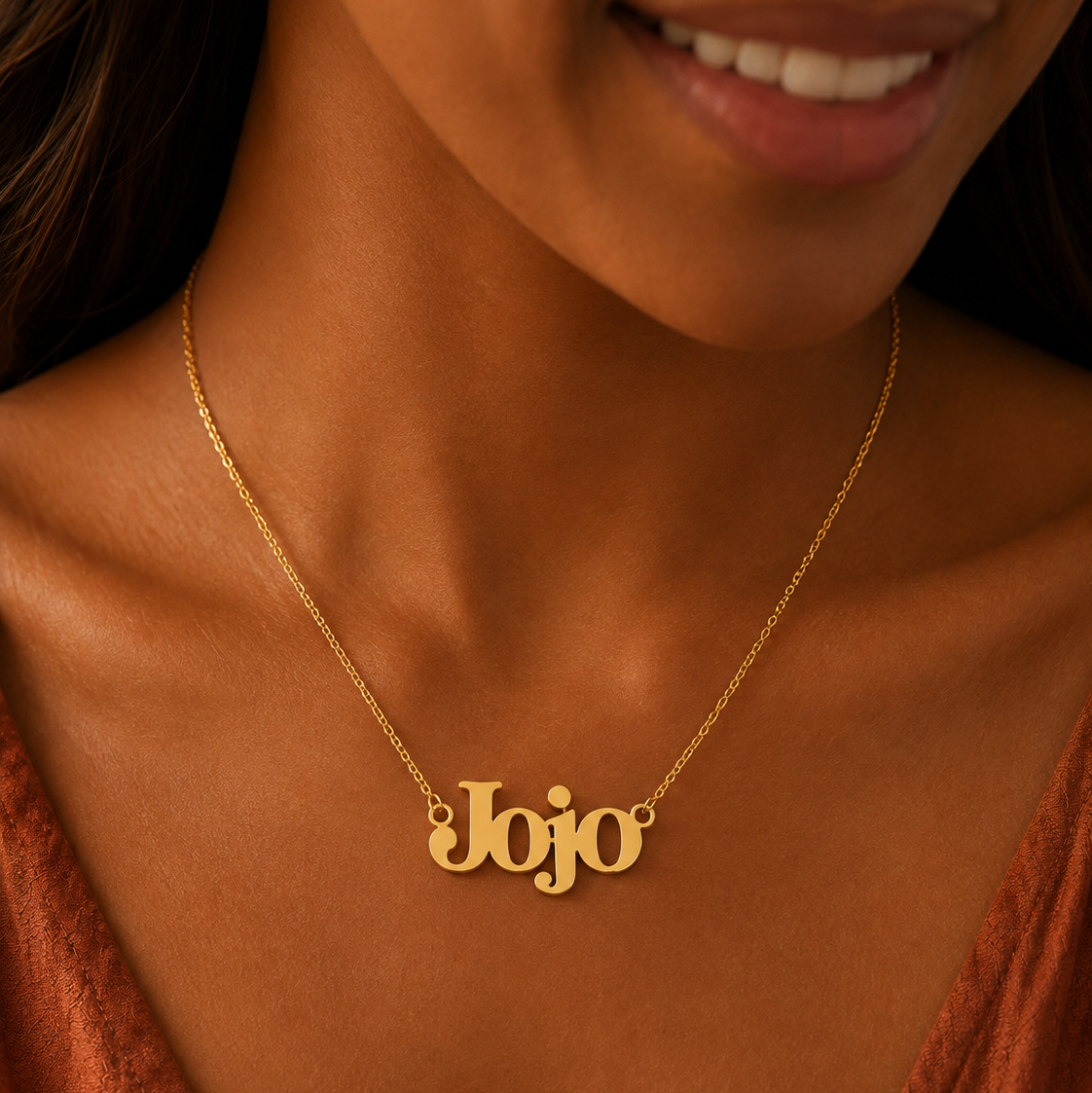 Personalised Cleo Name Necklace in a gold finish worn on a model
