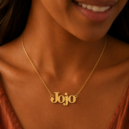 Personalised Cleo Name Necklace in a gold finish worn on a model