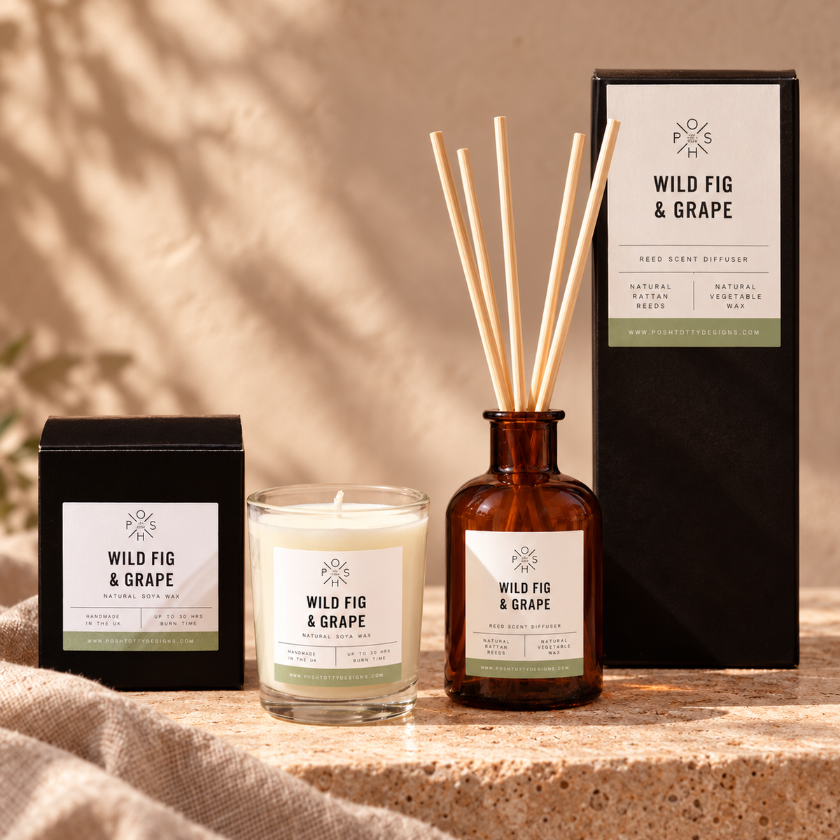 Wild Fig & Grape 9cl candle and 100ml reed diffuser staged together with their individual boxes